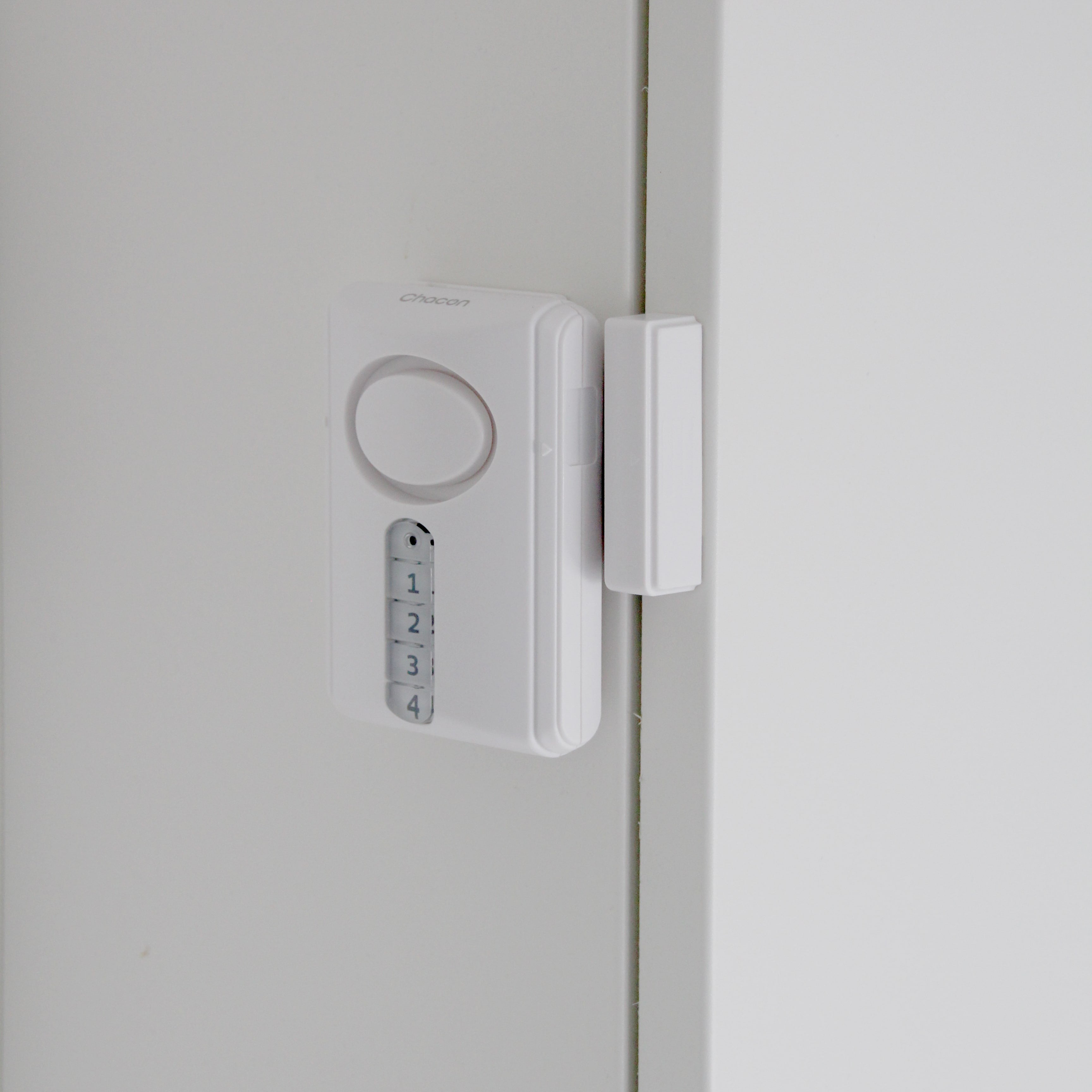 Detector de apertura con alarma + código