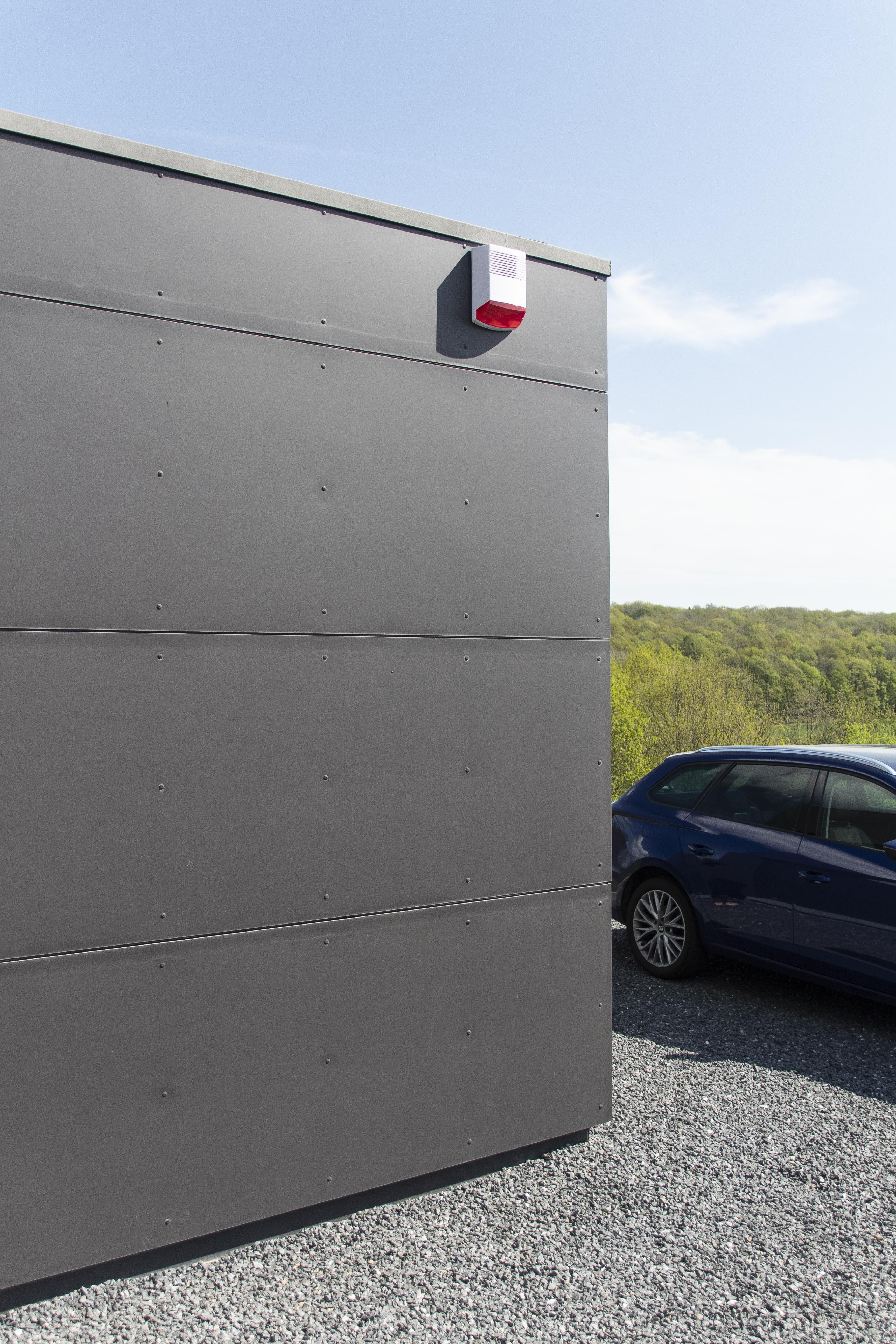 Dummy alarm siren with flashing red LED