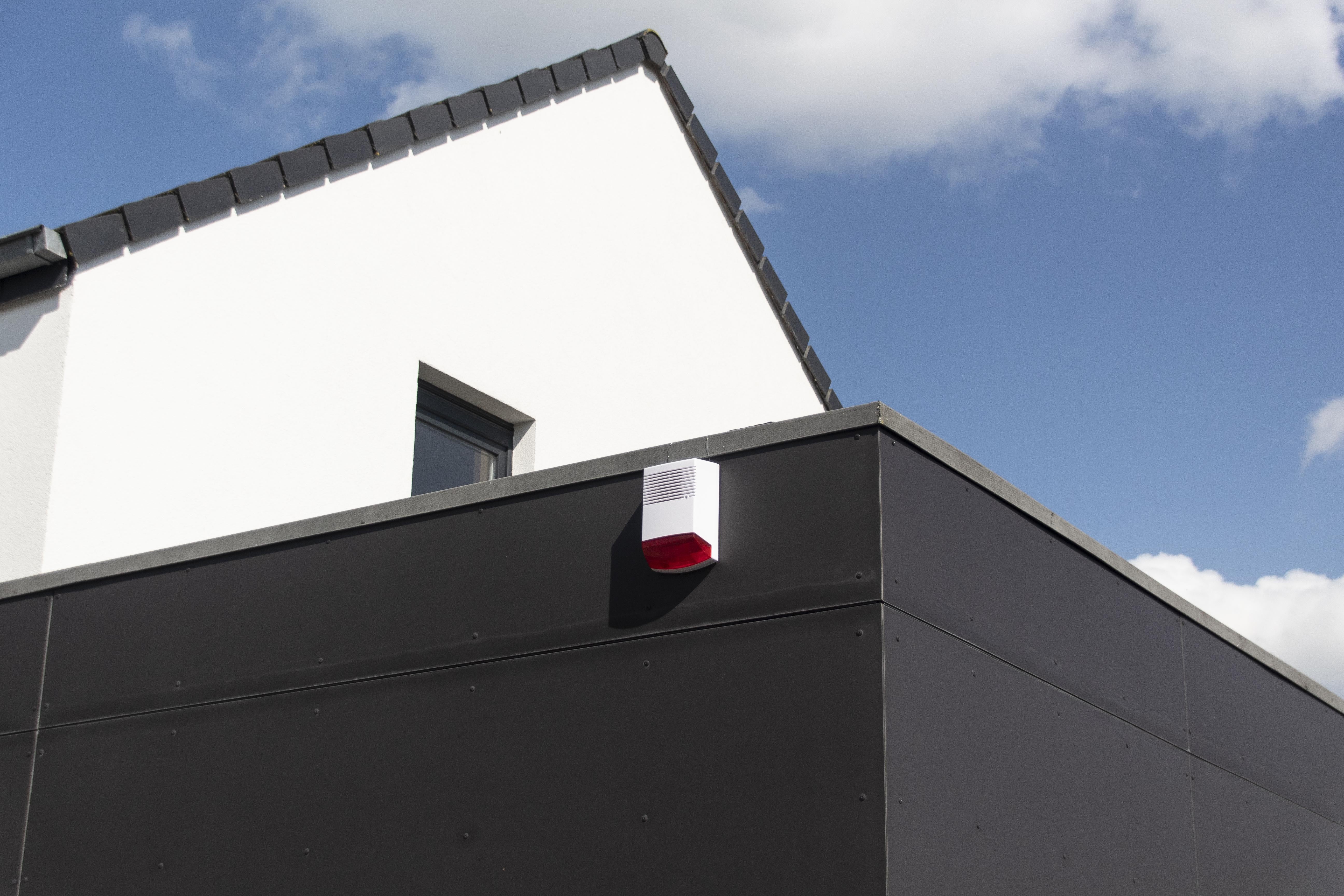 Dummy alarm siren with flashing red LED