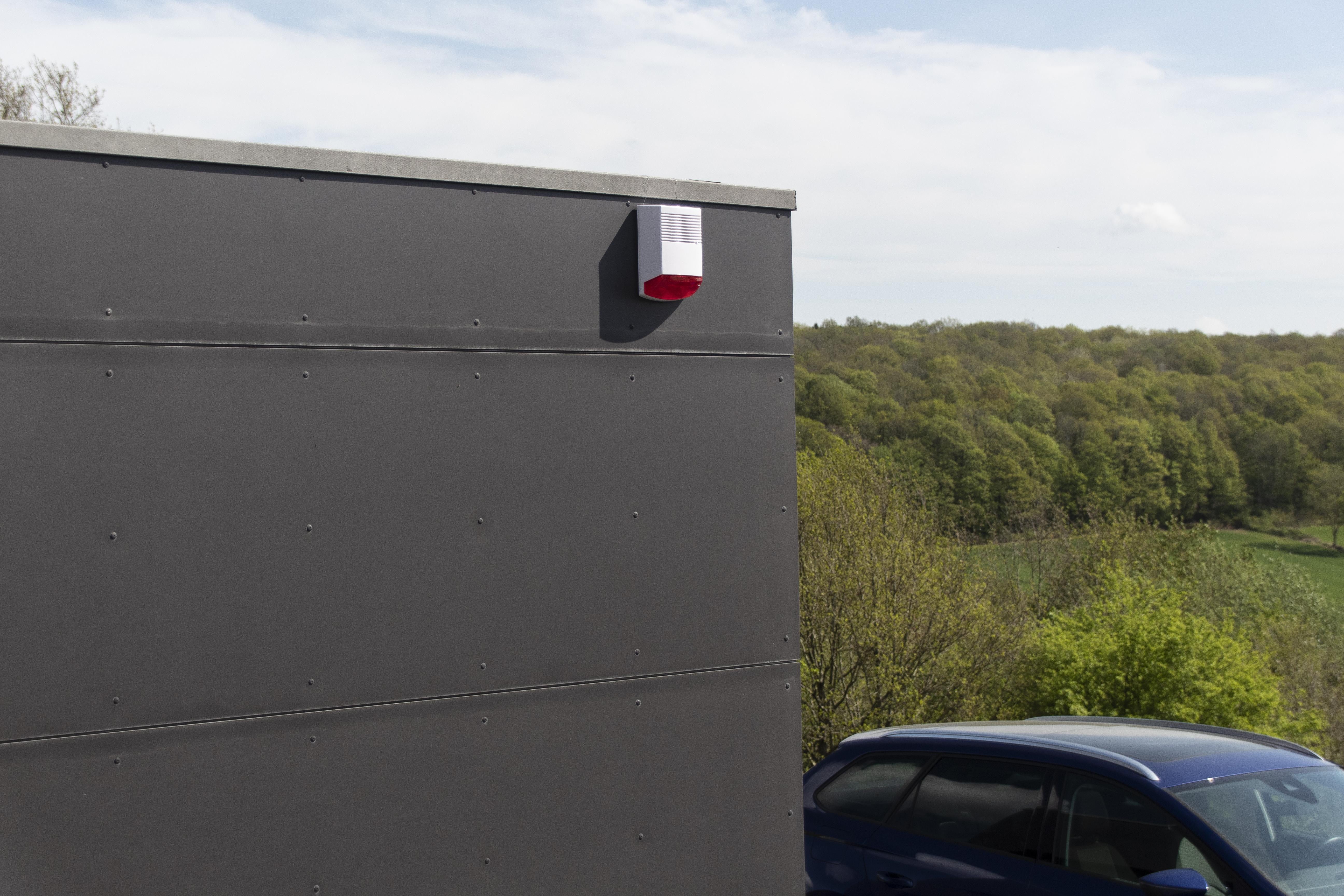 Dummy alarm siren with flashing red LED